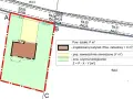 Wypełniony wniosek o warunki zabudowy z zaznaczonym projektowanym budynkiem i terenami zielonymi na mapie działki.