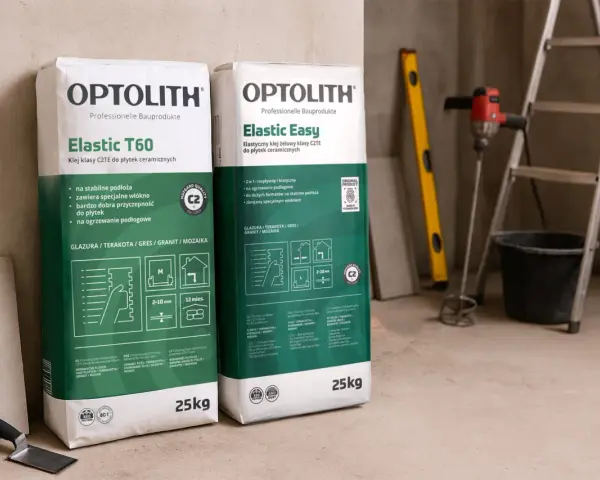 Dwa worki kleju Optolith Elastic T60 i Elastic Easy. Idealny klej do płytek na ogrzewanie podłogowe, zapewniający doskonałą przyczepność.